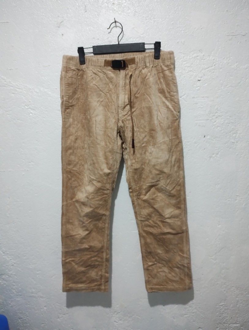 Gramicci Corduroy Pants Tan Size M (Category: Trousers) located in Imus. Submitted by darylg88358770 (Listing ID 1464898014, Image 2). Description: - Brand: Gramicci - Item: Corduroy Pants - Color: Tan - Size: Asia L (USA/EU M) - Fit: Relaxed fit with comfortable elastic waistband - Features: Integrated climbing belt, button-closure back pockets, and iconic brand label tag - Material: 98% cotton, 2% polyurethane - Condition: Brand new / Excellent