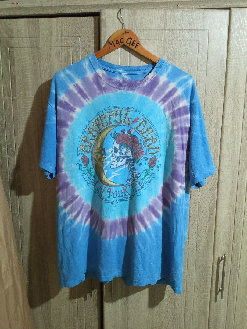 Grateful Dead Fall Tour 89 Tie Dye T-shirt (Category: Tshirts & Polo Shirts ) located in Manila. Submitted by genitereym17524 (Listing ID 1464852479, Image 1). Description: -Dimes W-24 L28 Authentic Grateful Dead Fall Tour 89 design with classic skull, roses, and moon graphics - Eye-catching all-over blue and purple tie-dye pattern - Comfortable short sleeves and classic crew neck - Trendy, laid-back vintage rock aesthetic - Relaxed, oversized fi
