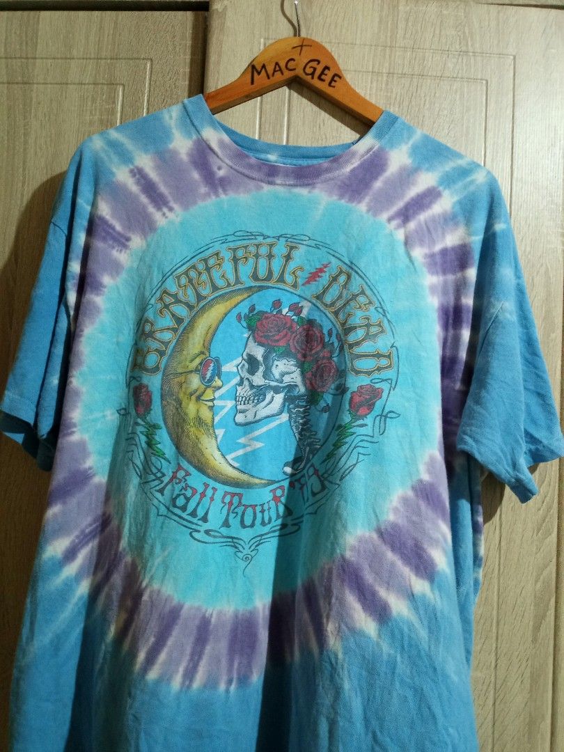 Grateful Dead Fall Tour 89 Tie Dye T-shirt (Category: Tshirts & Polo Shirts ) located in Manila. Submitted by genitereym17524 (Listing ID 1464852479, Image 3). Description: -Dimes W-24 L28 Authentic Grateful Dead Fall Tour 89 design with classic skull, roses, and moon graphics - Eye-catching all-over blue and purple tie-dye pattern - Comfortable short sleeves and classic crew neck - Trendy, laid-back vintage rock aesthetic - Relaxed, oversized fi