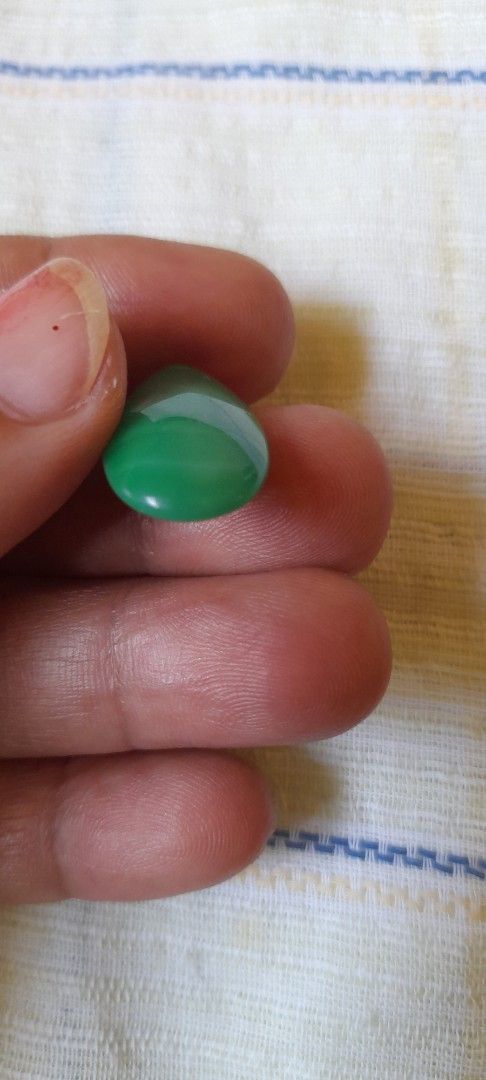 Green tear drop jade pendant (Category: Necklaces) located in Bocaue. Submitted by marajapansurplus (Listing ID 1464773993, Image 2). Description: - Stunning green teardrop stone pendant - Pre-drilled hole near the top for easy hanging on a cord or chain - Smooth, polished finish showcasing unique natural banding and color variations - Lightweight design that is comfortable to wear - Ideal for DIY jewelry making and custom accessories.