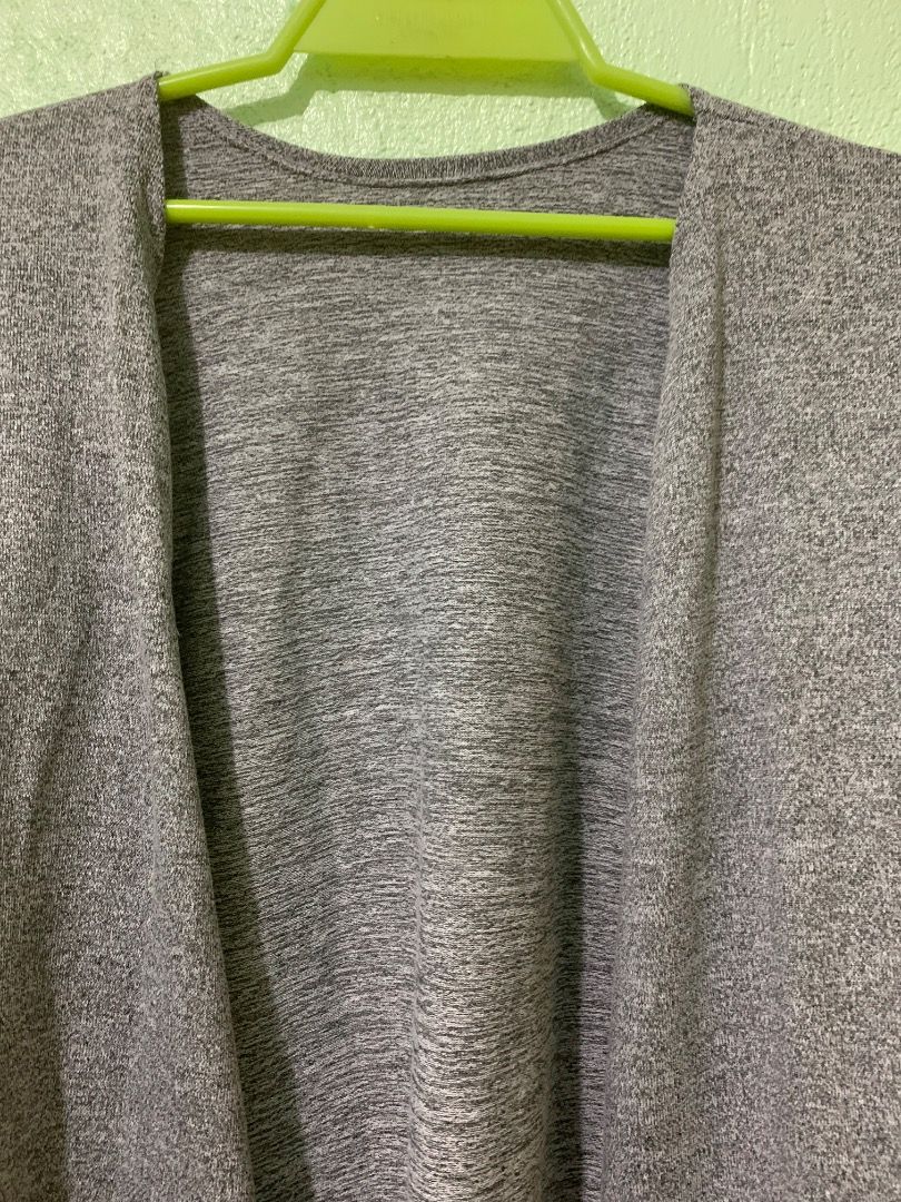 Grey Long Sleeve Open Front Cardigan (Category: Coats, Jackets and Outerwear) located in Daraga. Submitted by ryrilim (Listing ID 1464923199, Image 2). Description: - Color: Versatile grey - Style: Open-front, relaxed drape design - Sleeves: Long sleeves - Material: Soft heathered knit texture - Best for: Easy everyday layering during cooler weather or air-conditioned rooms.