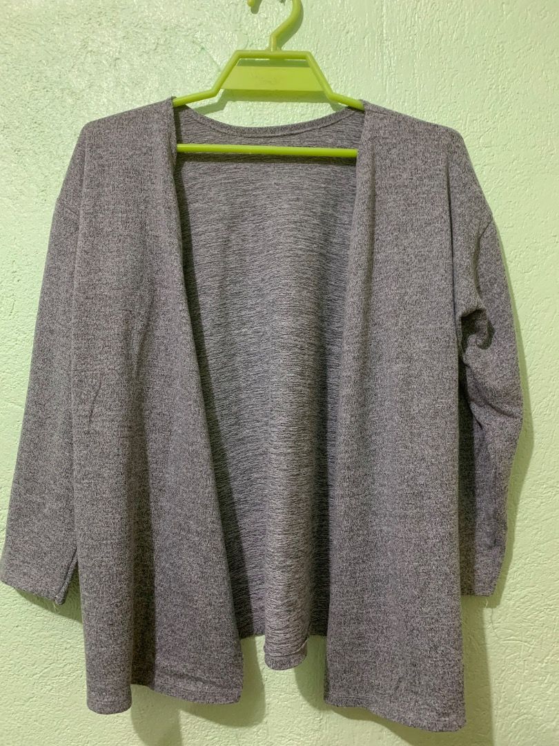 Grey Long Sleeve Open Front Cardigan (Category: Coats, Jackets and Outerwear) located in Daraga. Submitted by ryrilim (Listing ID 1464923199, Image 1). Description: - Color: Versatile grey - Style: Open-front, relaxed drape design - Sleeves: Long sleeves - Material: Soft heathered knit texture - Best for: Easy everyday layering during cooler weather or air-conditioned rooms.
