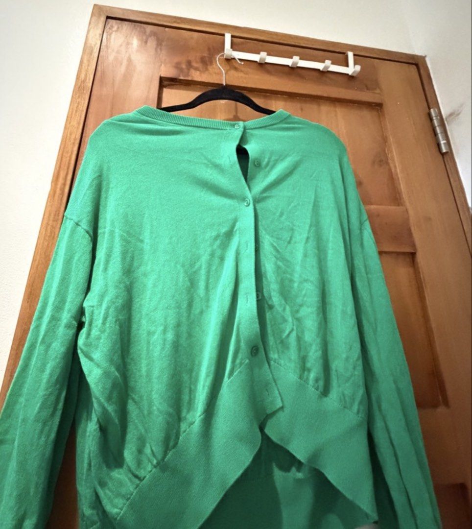 GU Green Cardigan Sweater Button Down (Category: Coats, Jackets and Outerwear) located in Manila. Submitted by happymelona (Listing ID 1464898493, Image 1). Description: - from japan -Color: Bright green - Fit: Slouchy, relaxed fit - Material: Lightweight knit - Features: Long sleeves, front button closure, ribbed trim on neckline and hem - Style: Easy to throw on over basic tops for effortless layering.