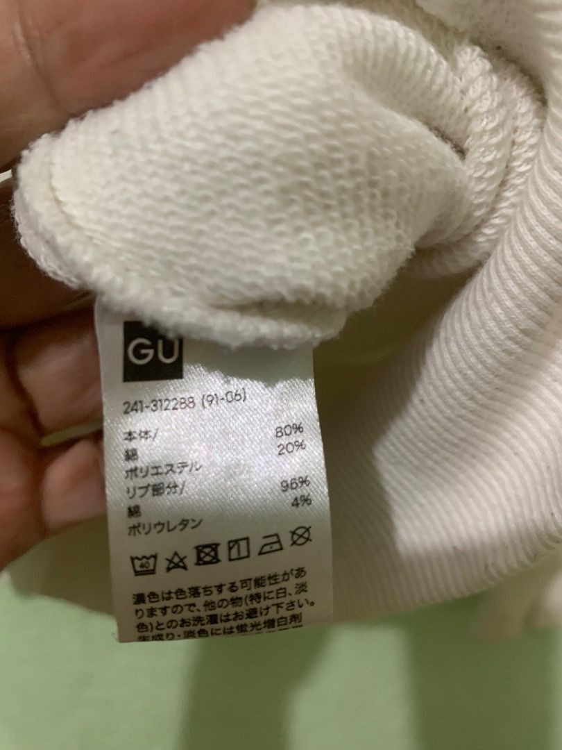 GU White Hoodie Size XL (Category: Hoodies) located in Daraga. Submitted by ryrilim (Listing ID 1464919613, Image 2). Description: - Brand: GU - Color: White - Size: XL - Material: Comfortable cotton and polyester blend - Features: Drawstring hood and front kangaroo pocket - Details: Ribbed cuffs and hem - Fit: Relaxed and comfortable for daily casual wear.