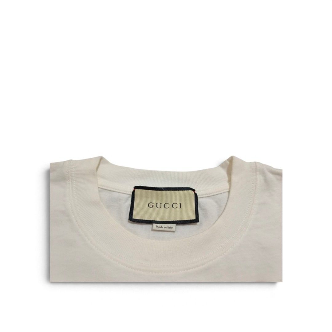 Gucci Geometric Logo Tee (Category: Tshirts & Polo Shirts ) located in Manila. Submitted by southstreethub.ph (Listing ID 1464895757, Image 3). Description: - Gucci Geometric Logo Tee - Condition: Very Good Condition - Size: Medium (M) - Dimention: 21 Width 28 Lenght - Eye-catching geometric red and blue logo graphic on the chest - Classic crew neck and short sleeves - Premium soft cotton, made in Italy - Interior brand and care tags intact - Exc