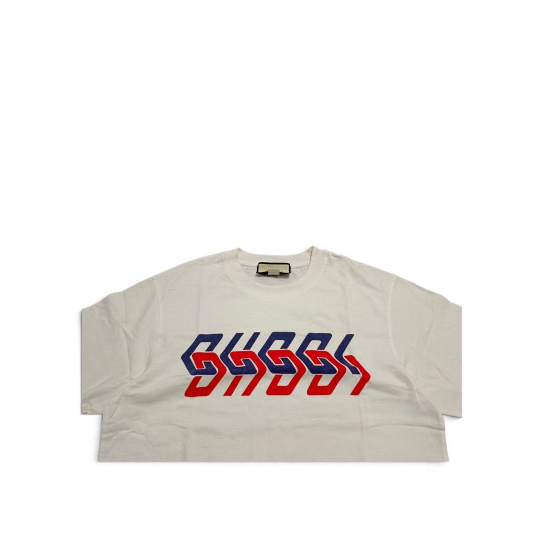 Gucci Geometric Logo Tee (Category: Tshirts & Polo Shirts ) located in Manila. Submitted by southstreethub.ph (Listing ID 1464895757, Image 2). Description: - Gucci Geometric Logo Tee - Condition: Very Good Condition - Size: Medium (M) - Dimention: 21 Width 28 Lenght - Eye-catching geometric red and blue logo graphic on the chest - Classic crew neck and short sleeves - Premium soft cotton, made in Italy - Interior brand and care tags intact - Exc