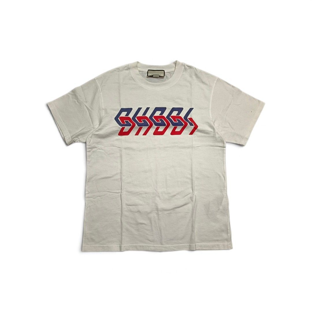 Gucci Geometric Logo Tee (Category: Tshirts & Polo Shirts ) located in Manila. Submitted by southstreethub.ph (Listing ID 1464895757, Image 1). Description: - Gucci Geometric Logo Tee - Condition: Very Good Condition - Size: Medium (M) - Dimention: 21 Width 28 Lenght - Eye-catching geometric red and blue logo graphic on the chest - Classic crew neck and short sleeves - Premium soft cotton, made in Italy - Interior brand and care tags intact - Exc