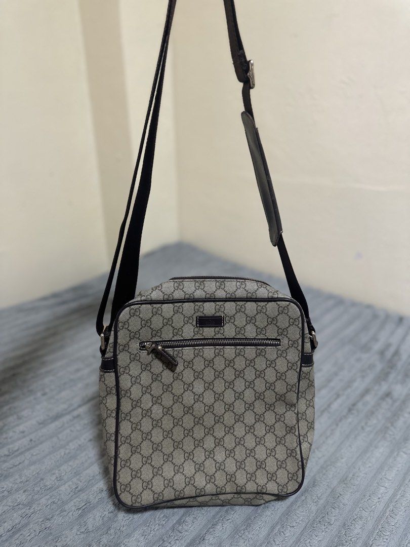 Gucci GG Supreme Canvas Messenger Bag (Category: Luxury Bags & Wallets) located in Baguio. Submitted by annecicat (Listing ID 1464776241, Image 2). Description: - Gucci messenger bag in classic GG Supreme canvas - Premium brown leather trim and durable brown fabric lining - Adjustable shoulder strap complete with a comfortable leather shoulder pad - Convenient front zip pocket for quick-access items - Secure main compartment featuring an interior