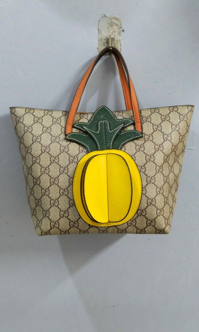 Gucci GG supreme monogram pineapple kid tote bag (Category: Luxury Bags & Wallets) located in Trece Martires City. Submitted by vherma (Listing ID 1464770357, Image 2). Description: gucci GG monogram pineapple kod tote bag.