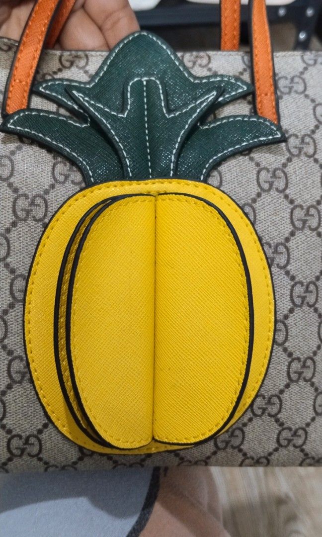 Gucci GG supreme monogram pineapple kid tote bag (Category: Luxury Bags & Wallets) located in Trece Martires City. Submitted by vherma (Listing ID 1464770357, Image 3). Description: gucci GG monogram pineapple kod tote bag.