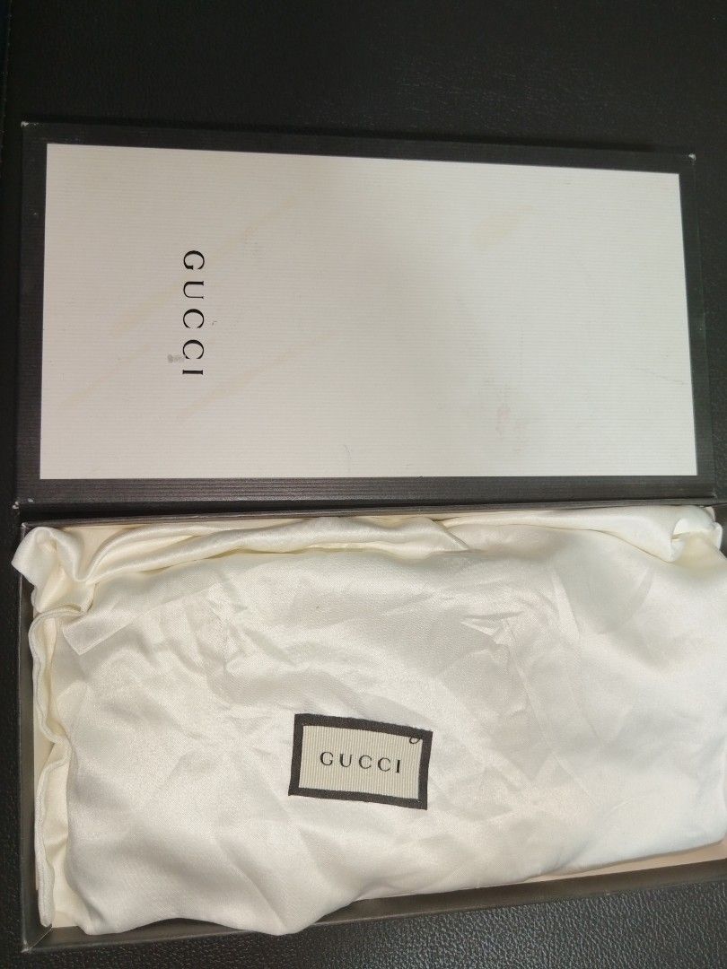 Gucci Soho Zip around wallet (w/ box) (Category: Luxury Bags & Wallets) located in Antipolo. Submitted by gievan0725 (Listing ID 1464854730, Image 2). Description: The highlighted item is a Gucci Soho Zip-Around Long Wallet. This iconic accessory is crafted from vibrant magenta/fuchsia pink pebbled leather and features the signature embossed interlocking GG logo centered on the front. Product Specifications • Brand: Gucci • Line: Soho Collection 