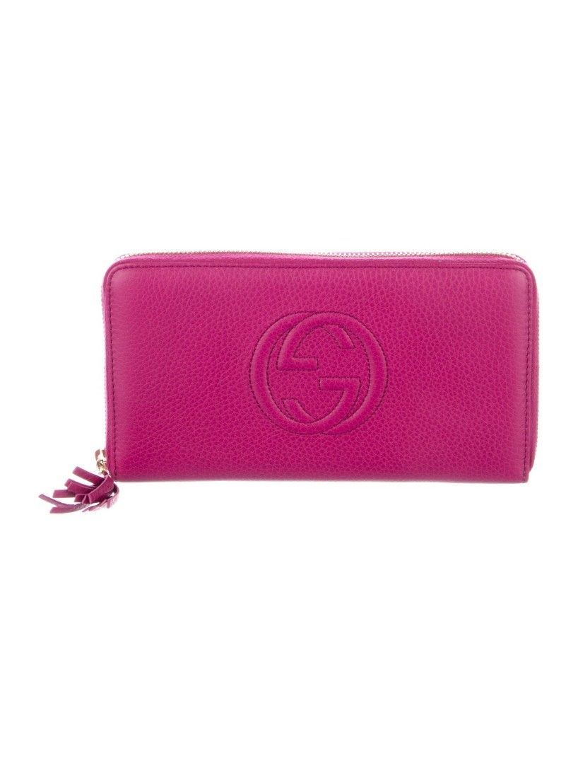 Gucci Soho Zip around wallet (w/ box) (Category: Luxury Bags & Wallets) located in Antipolo. Submitted by gievan0725 (Listing ID 1464854730, Image 1). Description: The highlighted item is a Gucci Soho Zip-Around Long Wallet. This iconic accessory is crafted from vibrant magenta/fuchsia pink pebbled leather and features the signature embossed interlocking GG logo centered on the front. Product Specifications • Brand: Gucci • Line: Soho Collection 