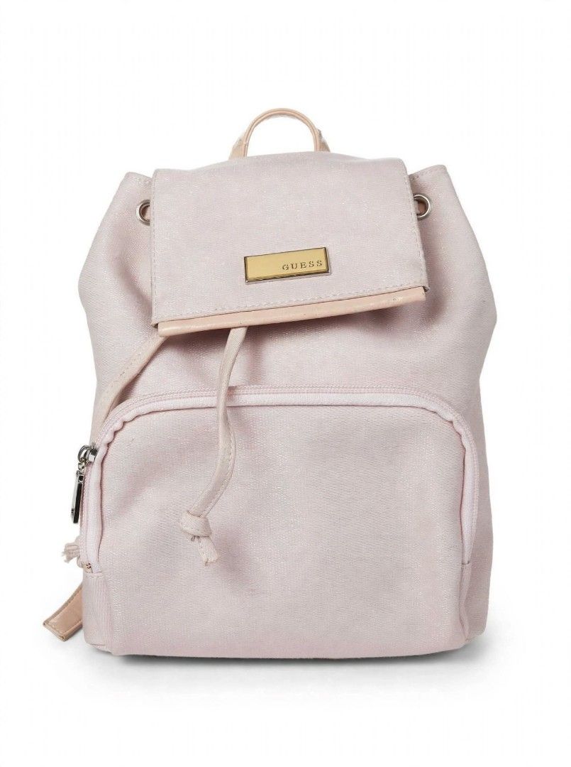Guess light pink backpack (Category: Backpacks) located in Caloocan City. Submitted by chonadura91470 (Listing ID 1464778136, Image 1). Description: - Authentic Guess backpack in light pink - Features chic gold-tone GUESS plaque and hardware - Drawstring closure with secure magnetic snap - Adjustable patent leather-look straps and top handle - Handy zippered front pocket for small essentials - Flaw note: Shows noticeable rust stains near seams an