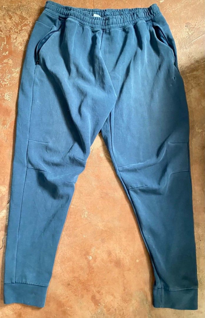 Gymshark Blue Joggers Size L (Category: Joggers) located in Gumaca. Submitted by makuliti (Listing ID 1464793630, Image 1). Description: - Brand/Model: Gymshark Blue Joggers - Size: Large - Material: 80% cotton, 13% recycled polyester, 7% elastane - Features: Adjustable drawstring waistband and secure zippered pockets on both sides - Condition: Good, with slight fabric fraying near one pocket zipper - Perfect for: Gym workouts or everyday casual 
