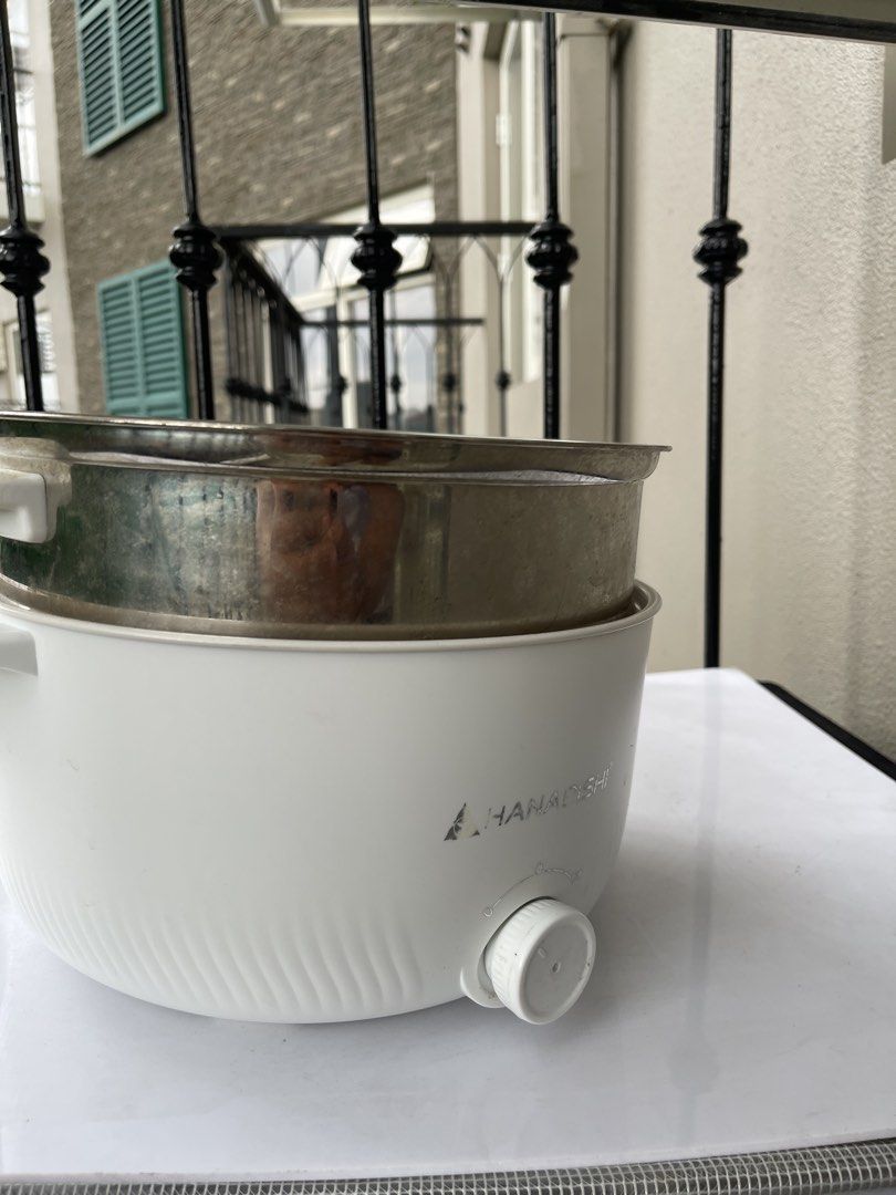 Hanabishi Electric Multi Cooker with Steamer (Category: Cookers) located in Quezon City. Submitted by Mike_0 (Listing ID 1464809603, Image 2). Description: Almost New Condition (Faded lang yung logo) Hanabishi Multi Cooker 1700 Slight Negotiable Location - Cypress Village Cainta Rizal.