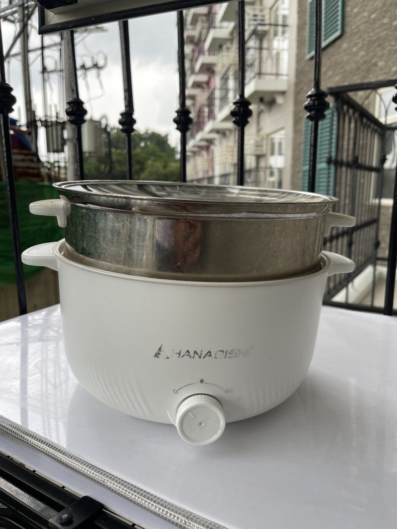 Hanabishi Electric Multi Cooker with Steamer (Category: Cookers) located in Quezon City. Submitted by Mike_0 (Listing ID 1464809603, Image 1). Description: Almost New Condition (Faded lang yung logo) Hanabishi Multi Cooker 1700 Slight Negotiable Location - Cypress Village Cainta Rizal.