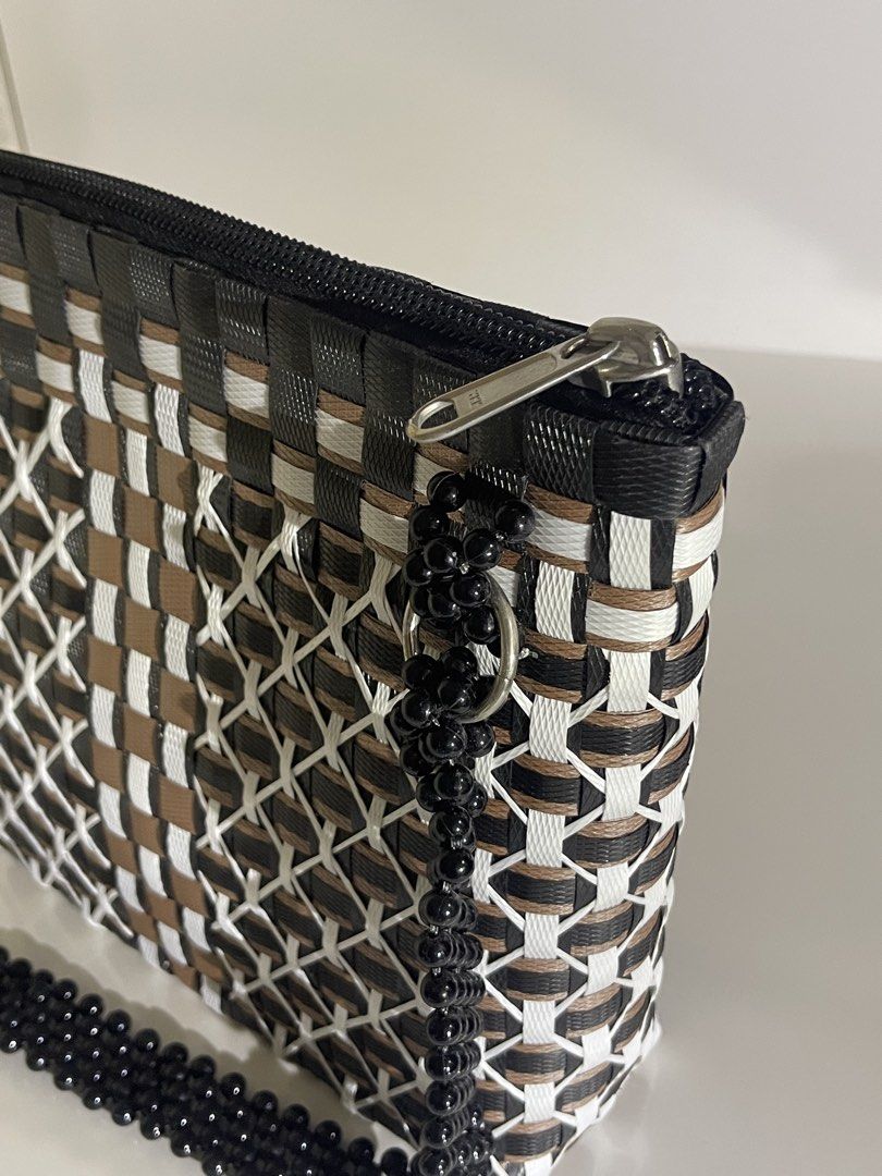 Handmade bags (Category: Shoulder Bags) located in Muntinlupa City. Submitted by declutter.clubph (Listing ID 1464925152, Image 3). Description: “body material: durable recycled plastic closure: Top zipper handles: multi-strand hand beaded shoulder strap with metal ring attachments details: glossy black beadwork. geometric pattern with contrasting lattice accents style: Artisanal. Geometric craftmanship: handcrafted. hand-interlaced detailing. ha