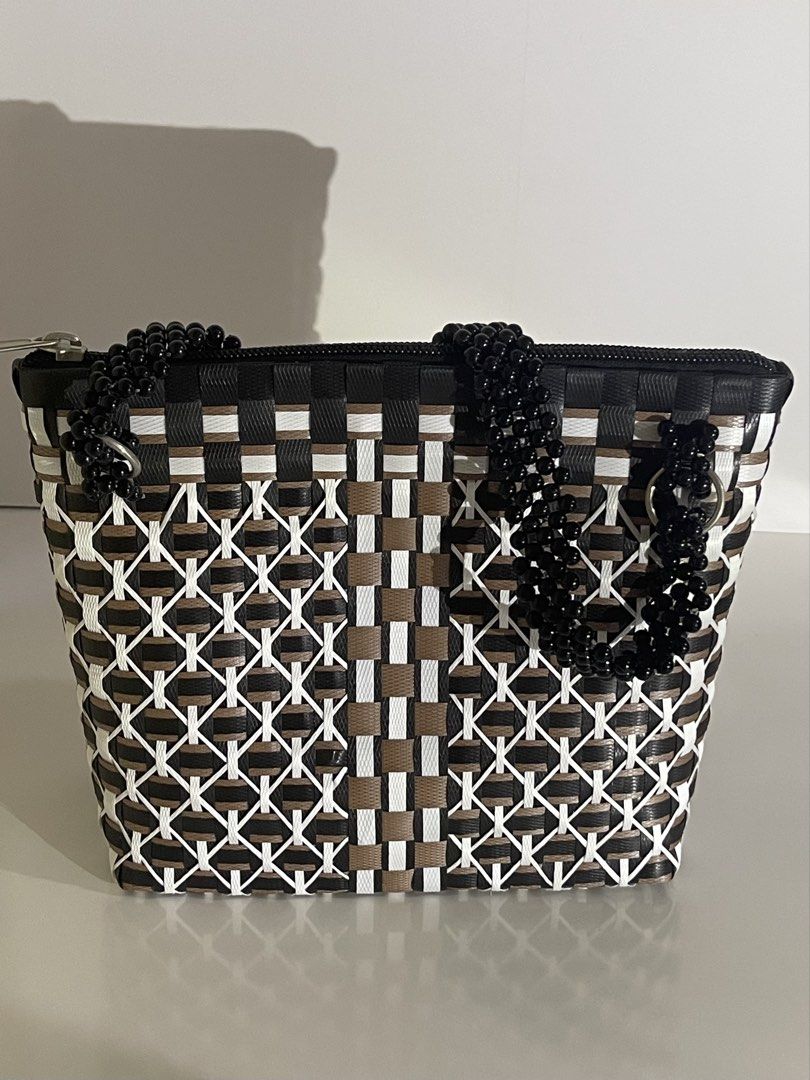 Handmade bags (Category: Shoulder Bags) located in Muntinlupa City. Submitted by declutter.clubph (Listing ID 1464925152, Image 1). Description: “body material: durable recycled plastic closure: Top zipper handles: multi-strand hand beaded shoulder strap with metal ring attachments details: glossy black beadwork. geometric pattern with contrasting lattice accents style: Artisanal. Geometric craftmanship: handcrafted. hand-interlaced detailing. ha