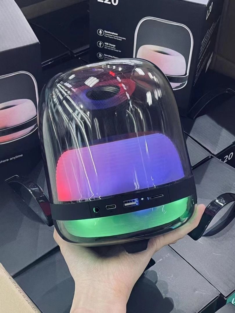 Harman Kardon L20 Transparent Wireless Bluetooth Speaker (Category: Soundbars, Speakers & Amplifiers) located in Malabon City. Submitted by noblestar.dd62c6 (Listing ID 1464777575, Image 1). Description: - Model: Harman Kardon L20 transparent wireless bluetooth speaker - Condition: Fully functional, tested, and working (comes with original retail box) - Lighting: Built-in multi-color LED ambient lights shifting through red, blue, yellow, and purp