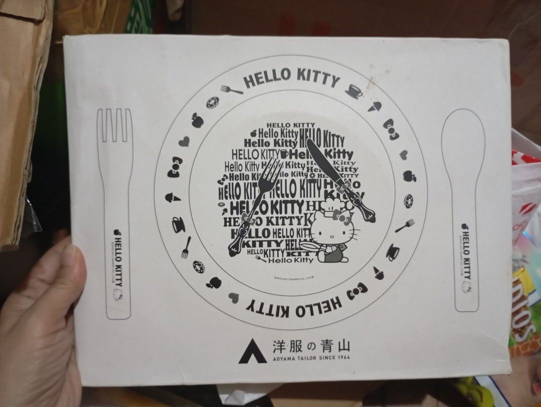 Hello kitty plate with spoon and fork (Category: Dinnerware & Cutlery) located in Manila. Submitted by ysabel1102 (Listing ID 1464843011, Image 1). Description: hello kitty melamine plates with spoon and fork set UN used with box but box has damage buy as is manage your expectation from Japan surplus.