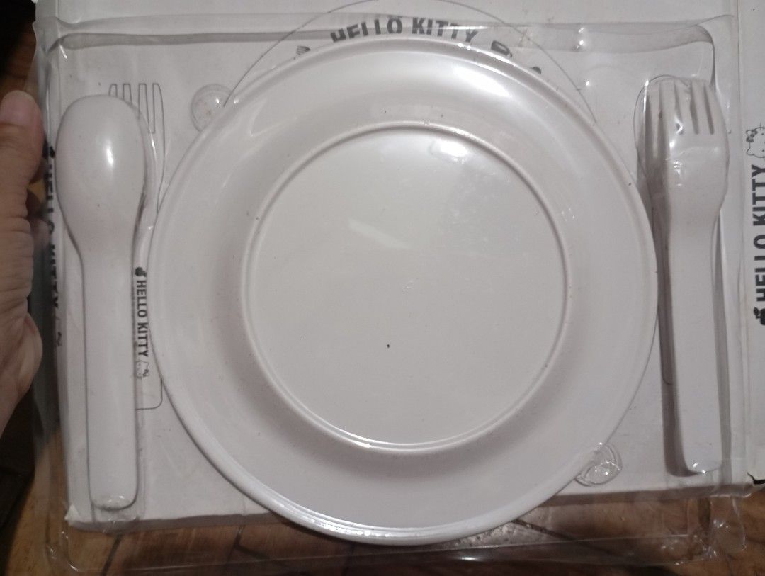 Hello kitty plate with spoon and fork (Category: Dinnerware & Cutlery) located in Manila. Submitted by ysabel1102 (Listing ID 1464843011, Image 3). Description: hello kitty melamine plates with spoon and fork set UN used with box but box has damage buy as is manage your expectation from Japan surplus.