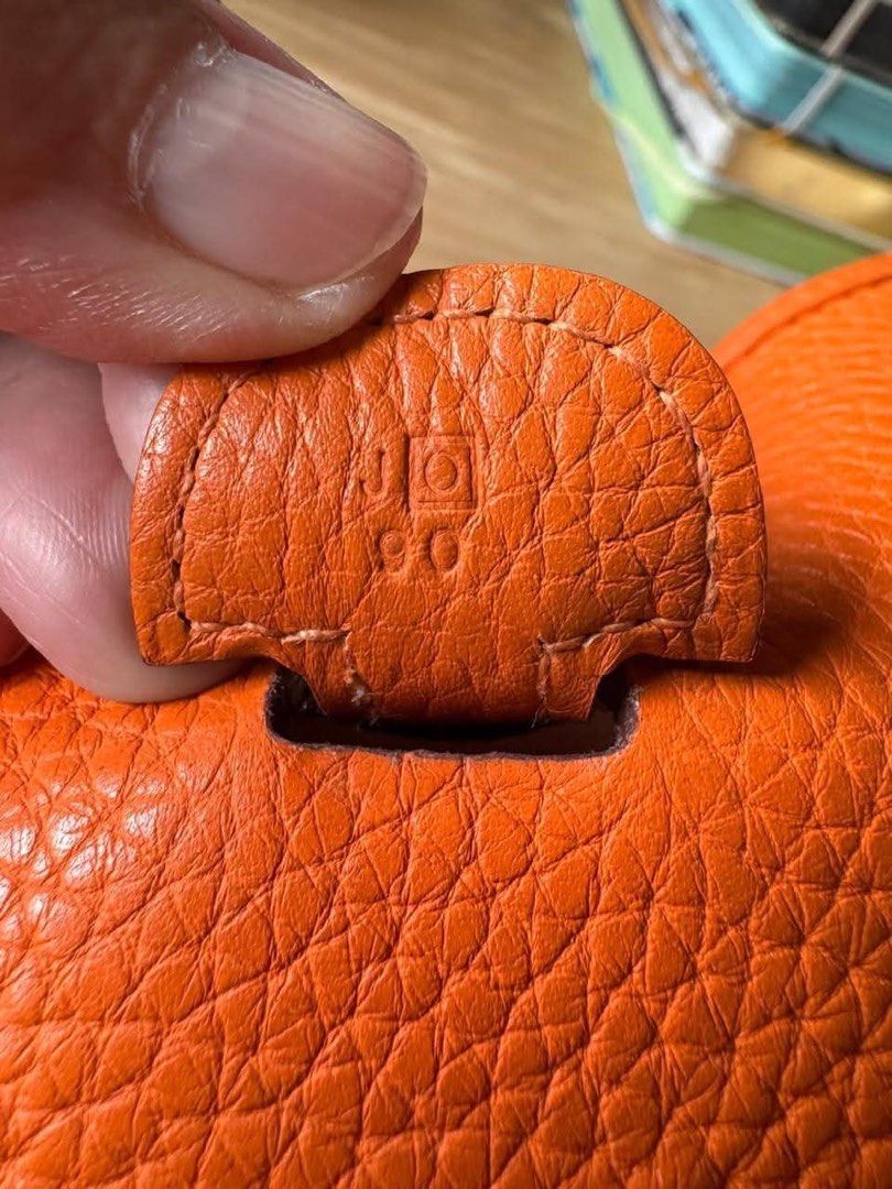 Hermès Evelyne III 33 (Category: Luxury Bags & Wallets) located in Paranaque City. Submitted by katsu.mea (Listing ID 1464959713, Image 2). Description: - Authentic Hermès Evelyne bag in iconic bright orange grained leather - Includes original blind stamp indicating production year (Square O) -Box and Dust bag .