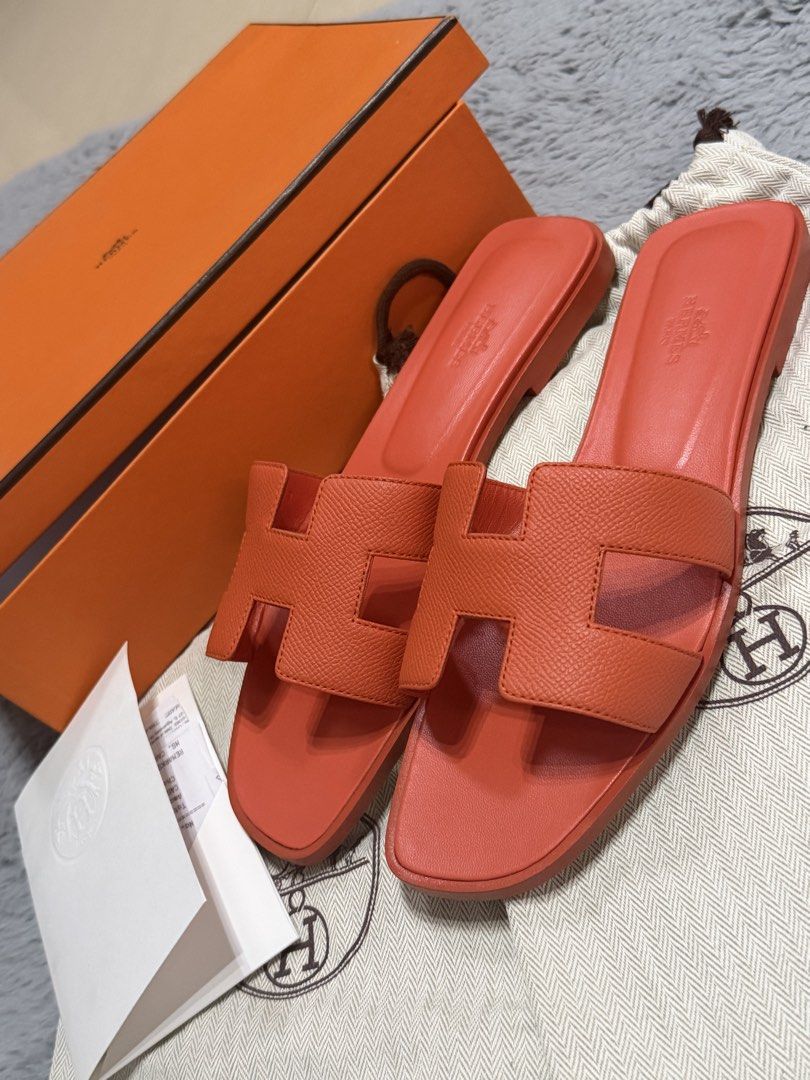 Hermès Orange Leather Sandals (Category: Flats & Sandals) located in Manila. Submitted by cool_foundbyme (Listing ID 1464837644, Image 2). Description: ✨ FOR SALE ✨ Hermès Oran Sandals 🧡 Color: Orange Size: 40 💰 ₱42,000 Authentic Hermès Oran in a beautiful orange shade. perfect for everyday wear or dressing up your look. 🤍 📌 Serious buyers only 📩 DM me for photos/details and inquiries..