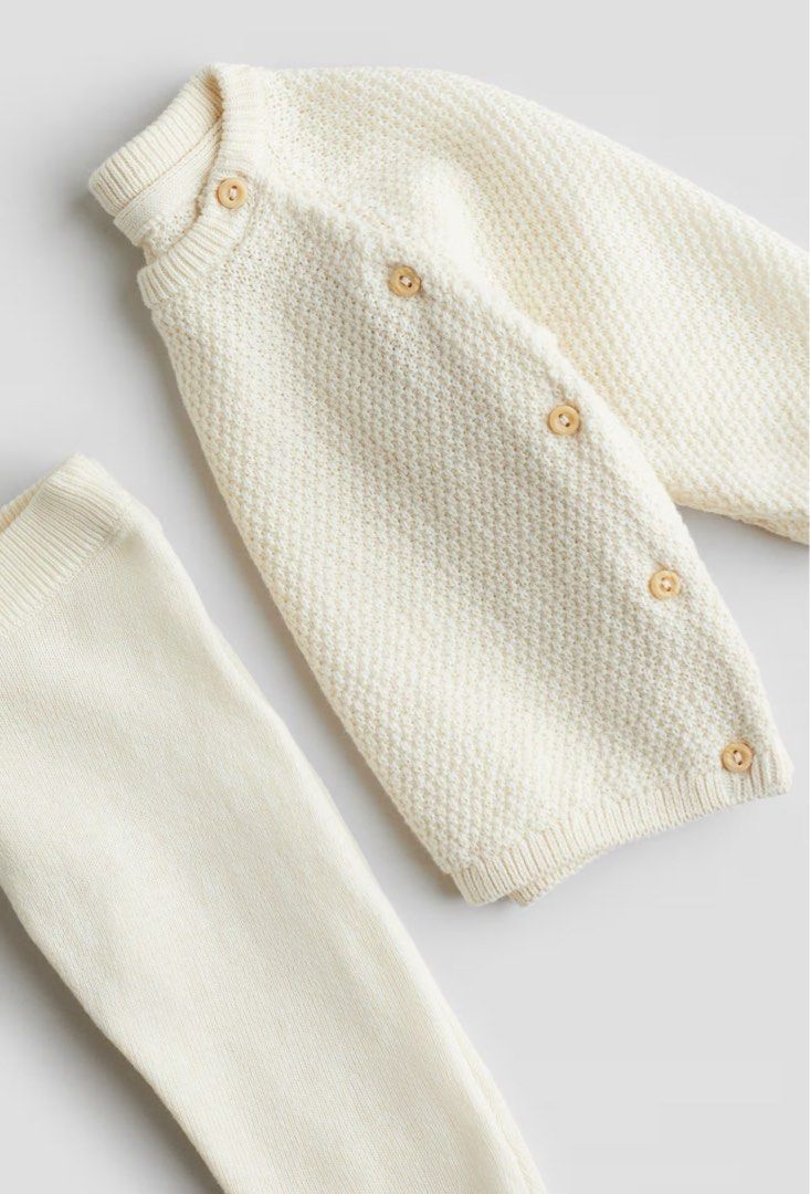 H&M Cream Knit Set (Category: Babies & Kids Fashion) located in Cebu City. Submitted by alexisdeclutters (Listing ID 1464771889, Image 2). Description: - Brand New with tags - 100% Cotton - Got for P999 - Adorable cream knit two-piece set for baby boys or girls - Long-sleeve pullover sweater featuring cute wooden side buttons - Matching knit leggings with a comfy elasticated waist - Made from soft, warm, and baby-friendly material - Neutral off-w
