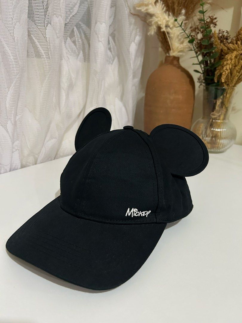 H&M Disney Mickey Mouse Cap (Category: Babies & Kids Fashion) located in Manila. Submitted by maison_marie (Listing ID 1464918828, Image 1). Description: Authentic. Almost brand new. Used once. Bought in Tokyo Disneyland. Classic black Mickey Mouse cap from H&M × Disney featuring cute Mickey ears and embroidered “Mickey” detail on the front. Adjustable back strap with a Mickey Mouse buckle for a comfortable fit. Washed and ready to wear. Location
