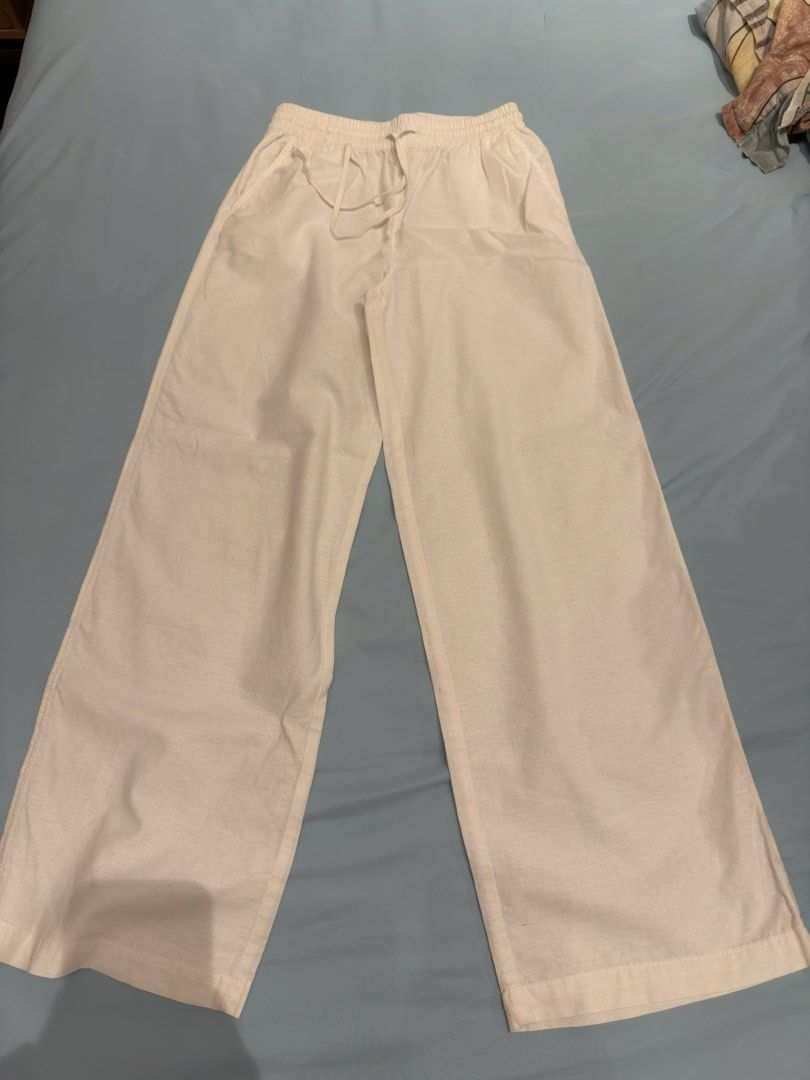 H&M linen blend white trousers pants (Category: Shorts) located in Manila. Submitted by vantes.rosie (Listing ID 1464907549, Image 1). Description: - used once - have yellow stains due to being stored in the closet for too long - will be washed before shipping out.