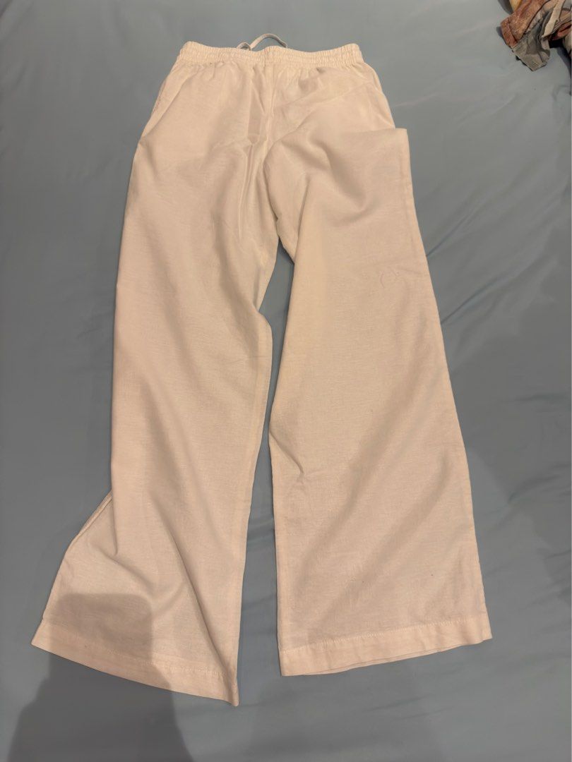 H&M linen blend white trousers pants (Category: Shorts) located in Manila. Submitted by vantes.rosie (Listing ID 1464907549, Image 2). Description: - used once - have yellow stains due to being stored in the closet for too long - will be washed before shipping out.