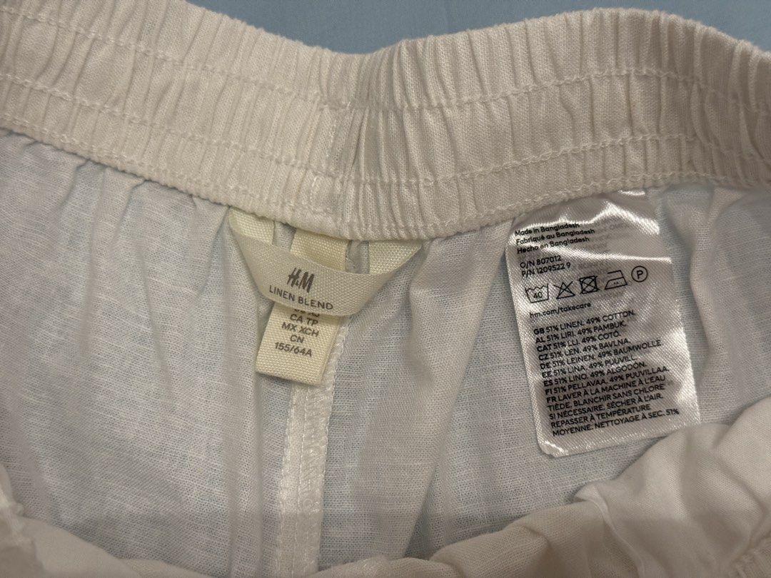 H&M linen blend white trousers pants (Category: Shorts) located in Manila. Submitted by vantes.rosie (Listing ID 1464907549, Image 3). Description: - used once - have yellow stains due to being stored in the closet for too long - will be washed before shipping out.