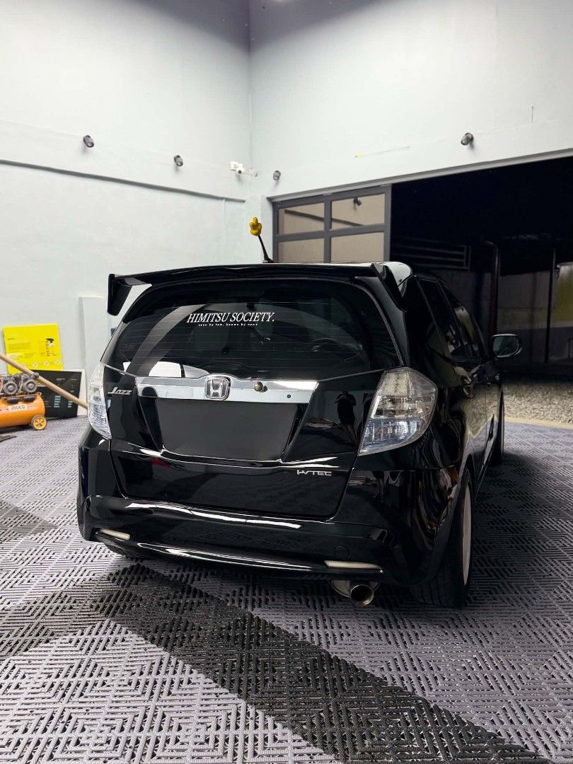 Honda Jazz (M) (Category: Used Cars) located in Dagupan City. Submitted by silvercat_cd7b23 (Listing ID 1464809584, Image 3). Description: Well maintained. Very fuel efficient! For Sale‼️ 2013 Honda Jazz GE 1.3 Manual Transmission SEMI LOADED Details: Newly Ceramic Coating Sept 2026 Newly change oil June 2026 92,xxx odo orig mileage unli scan Complete original papers With manual booklet 1st owner acq., open DOS LTO Registered til 2027 Ice Cold AC