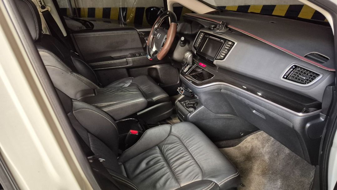 Honda Odyssey 2.4 EXV Premium (A) (Category: Used Cars) located in San Juan City. Submitted by sun_william_chong (Listing ID 1464786293, Image 2). Description: Honda Odyssey 2.4 EX-V Year:2019 Variant:Top spec Japan Absolute Navi.Pearl White.Enthusiast owned. KM:44242KM Specs:360Cam,AutoPark,OttomanSeat,PowerDoor,HondaSENSING LTO:Renewed May 2026.Valid to May 2027.Clean OR CR Status:Duties and taxes fully paid.Guaranteed no hidden defects. Mainta