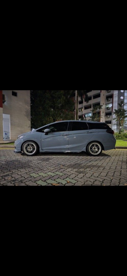 Honda Shuttle 1.5 G Honda Sensing (A) (Category: Used Cars) located in Singapore. Submitted by fareed93khan93 (Listing ID 1464812272, Image 2). Description: Well done up and taken care of Honda Shuttle Petrol model. Servicing done every 8000km. All wear and tear replaced. Things done to the ride: 1. Fresh paint work less than 2 years old (Porsche limited edt color) 2. Ori Enkei RPF1 17 Inch rims with Bridgestone RE004 tires used less than 10,000k