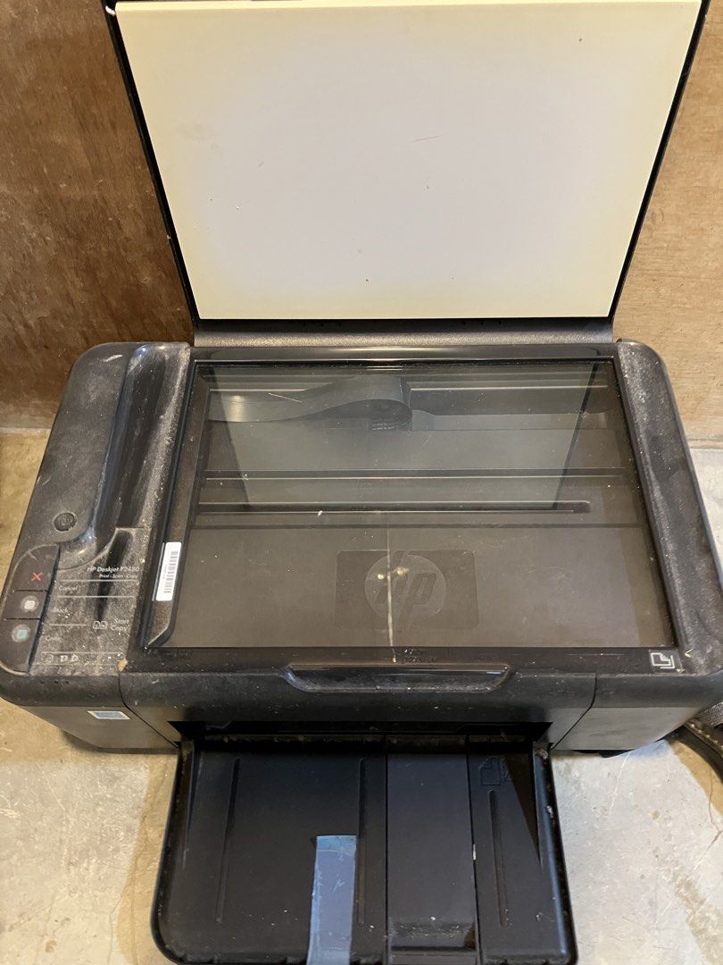 HP Deskjet F2480 All-in-One Printer (Category: Printers, Scanners & Copiers) located in Quezon City. Submitted by ponpin (Listing ID 1464833489, Image 2). Description: - HP Deskjet F2480 3-in-1 multifunction printer, scanner, and copier - Compact black plastic design with flatbed scanner and front-folding paper tray - Easy-to-use physical control buttons on the left panel - Unit only: power cord and connection cables are not included - Exterior i