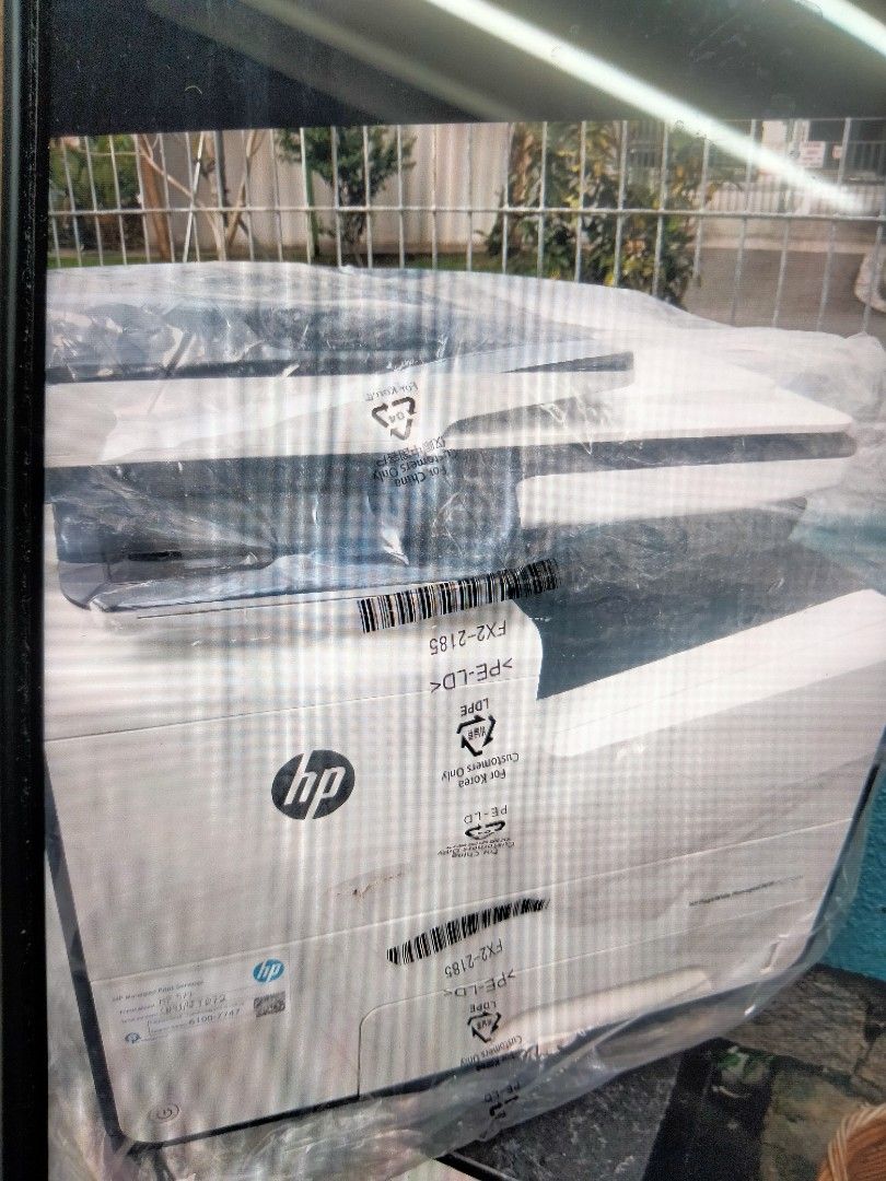 HP Printer (Category: Printers, Scanners & Copiers) located in Singapore. Submitted by elainelaiym (Listing ID 1464779079, Image 1). Description: - Brand: HP - Condition: likely new - Color: Stylish white and dark blue - Features: Built-in flatbed scanner and standard paper trays - Ideal for home or office use, ready to set up.