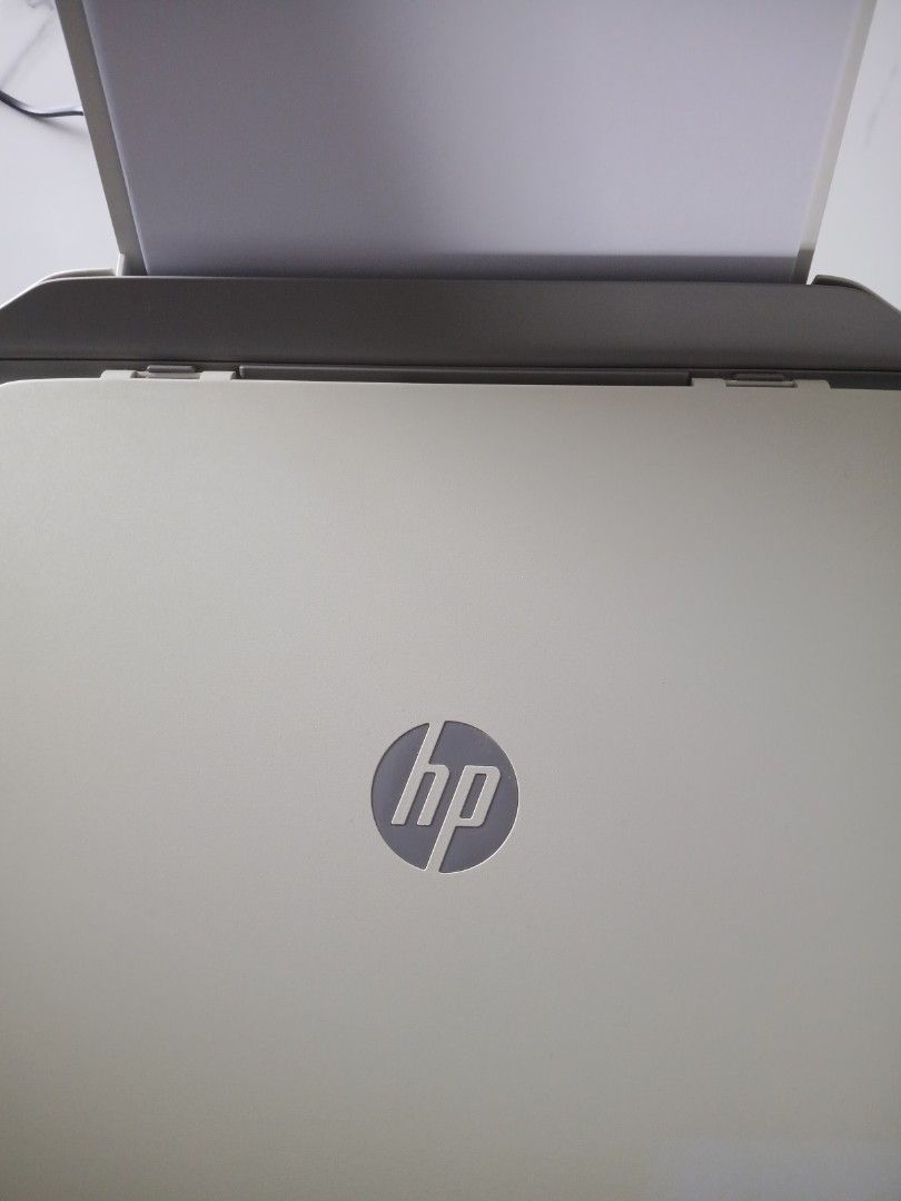 HP Printer (Category: Printers, Scanners & Copiers) located in Kuala Lumpur. Submitted by aljesrymo67693 (Listing ID 1464781081, Image 1). Description: - Model: HP Wireless Printer (White & Grey) - Compact space-saving design suitable for any desk - Easy-to-use control panel with LCD screen and intuitive buttons - Convenient rear paper input and front output trays - Condition: Powers on properly, fully functional, and ready for setup - What's inc