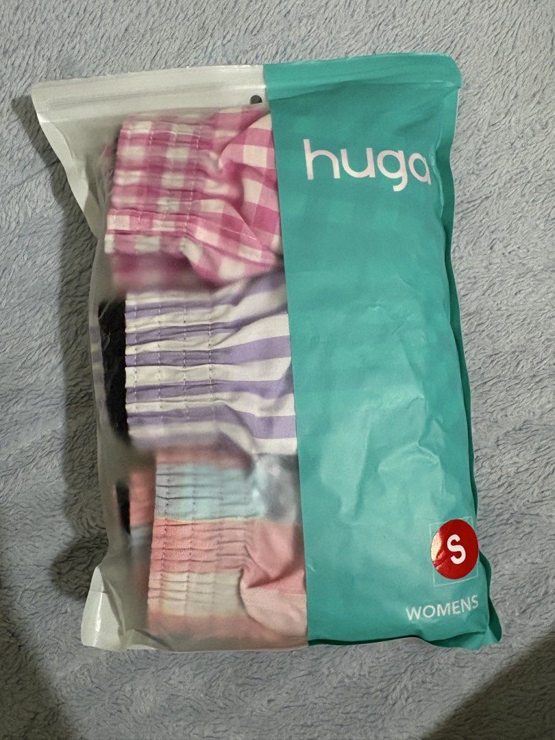 HUGA Womens Boxer Shorts 3 in 1 Pack Assorted (Category: Undergarments & Loungewear) located in Baguio. Submitted by sereneserenade (Listing ID 1464791135, Image 3). Description: - Brand: HUGA - Item: Women's Boxer Shorts (3-Pack) - Size: Small (S) - Designs: Pink gingham, purple stripe, and pink-blue plaid - Material: 100% breathable cotton - Best for: Casual wear and comfy pambahay - Condition: Brand new, never opened in original ziplock packag