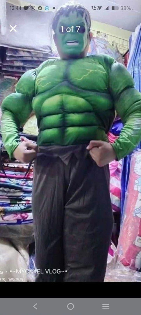 Hulk Muscle Costume with Mask (Category: Everything Else Others) located in Paranaque City. Submitted by ianaprilstar (Listing ID 1464887512, Image 2). Description: - one time used in original packaging - Includes green padded jumpsuit with printed abs and chest details - Comes with matching Hulk mask and dark pants - Great for costume parties and dress-up fun.