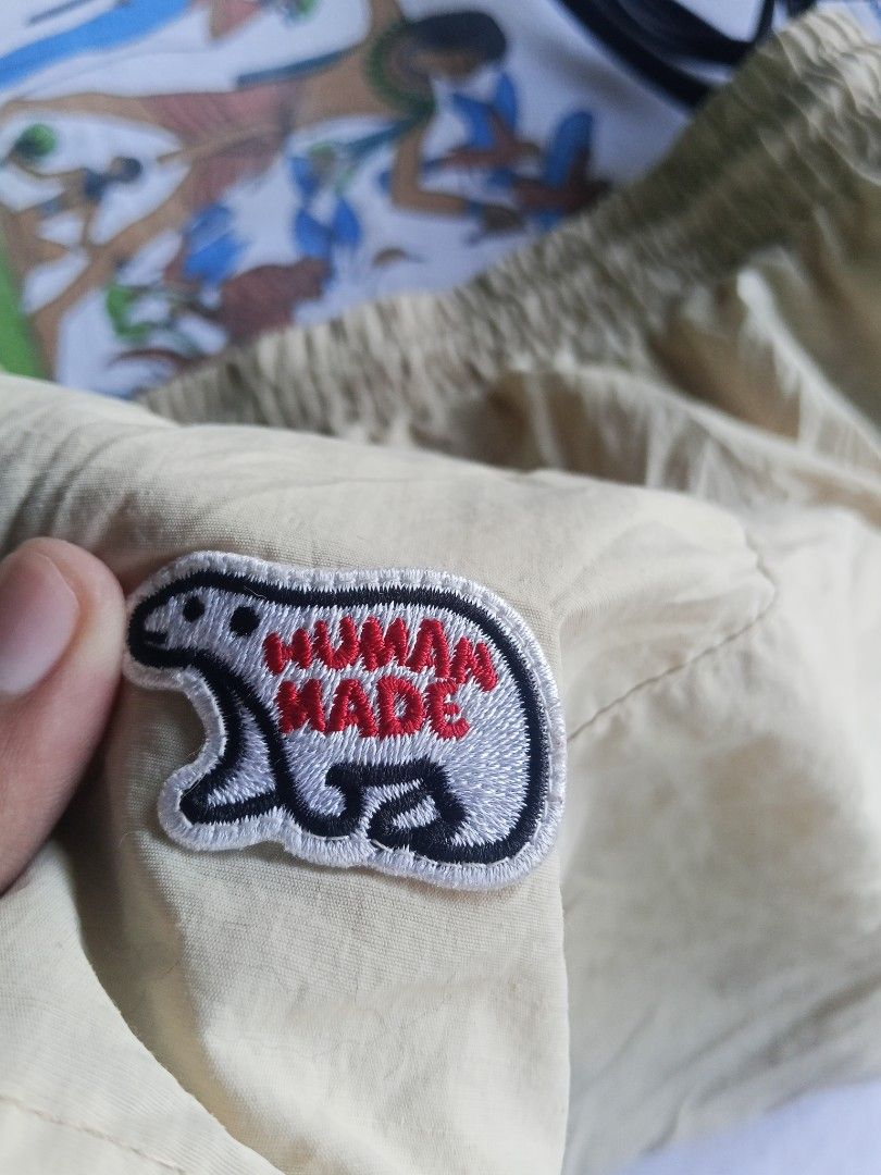 Human Made Beige Shorts Size L (Category: Shorts) located in Lingayen. Submitted by rahzzelula73279 (Listing ID 1464864057, Image 2). Description: - Brand: Human Made - Size: L - Color: Beige - Details: Elastic waistband with drawstring, embroidered polar bear patch with red lettering - Origin: Made in Japan - Condition: Clean fabric, brand and wash tags attached - Style: Casual wear.