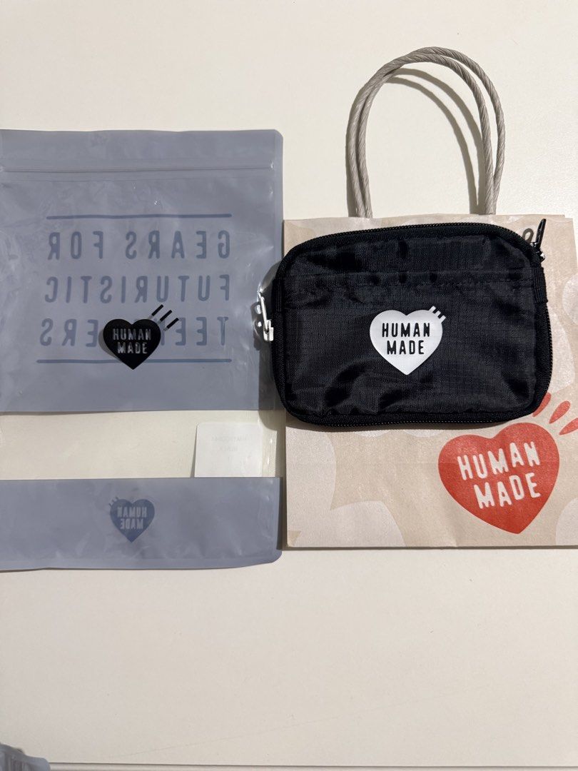 Human Made Travel Case Black (Category: Belt bags, Clutches and Pouches) located in Pasig City. Submitted by thetravellingguyinstyle (Listing ID 1464882536, Image 2). Description: - Brand: Human Made - Item: Travel Case / Pouch / Passport Holder - Color: Black - Condition: Brand new - Origin: Japan - Inclusions: Original packaging and paper bag.