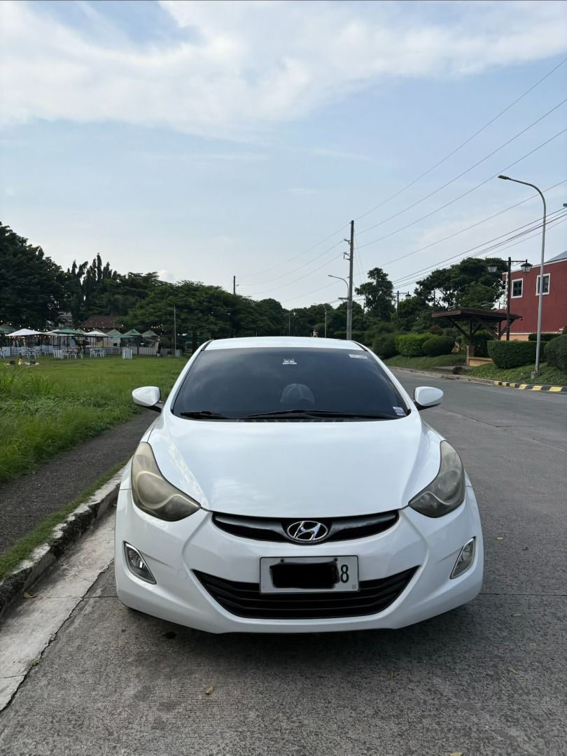 Hyundai Elantra 1.6 GL (A) (Category: Used Cars) located in Bacoor. Submitted by solomonlianaaleeza (Listing ID 1464902007, Image 2). Description: ‼️Selling my personal car Hyundai Elantra 2012 1.6 A/T 78, *** KM ODO New Battery 90% dunlop tires 17s OZ racing mags & tires Fresh Interior (leather seats) Android Head Unit w/ backcam & dashcam Complete papers & registered until 2027 ‼️ Gas and Go Minimal/light scratches only. Location: Molino bacoor