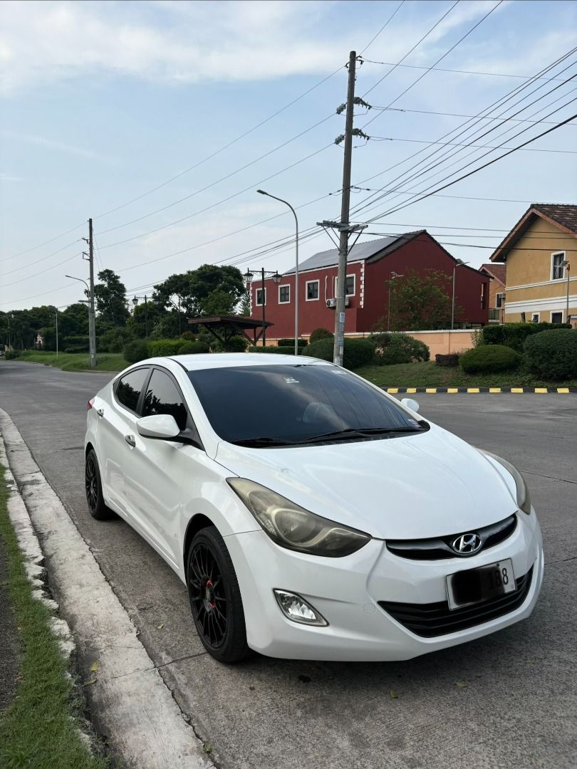Hyundai Elantra 1.6 GL (A) (Category: Used Cars) located in Bacoor. Submitted by solomonlianaaleeza (Listing ID 1464902007, Image 1). Description: ‼️Selling my personal car Hyundai Elantra 2012 1.6 A/T 78, *** KM ODO New Battery 90% dunlop tires 17s OZ racing mags & tires Fresh Interior (leather seats) Android Head Unit w/ backcam & dashcam Complete papers & registered until 2027 ‼️ Gas and Go Minimal/light scratches only. Location: Molino bacoor