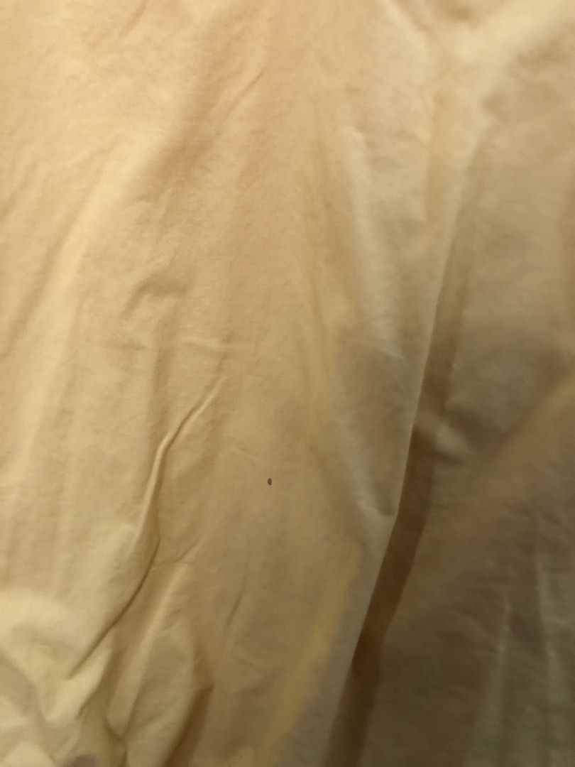 IEF Yellow Balloon Sleeve Blouse (Category: Blouses) located in Cauayan City . Submitted by wholly.craaaft (Listing ID 1464946434, Image 3). Description: Bright yellow blouse from IEF, size M (160/84A). Features a V-neckline with a mandarin collar, voluminous balloon sleeves, and a gathered bubble hem. Relaxed, oversized silhouette. One tiny dark spot near the lower front area, pictured in close-up. Clean inner tag..