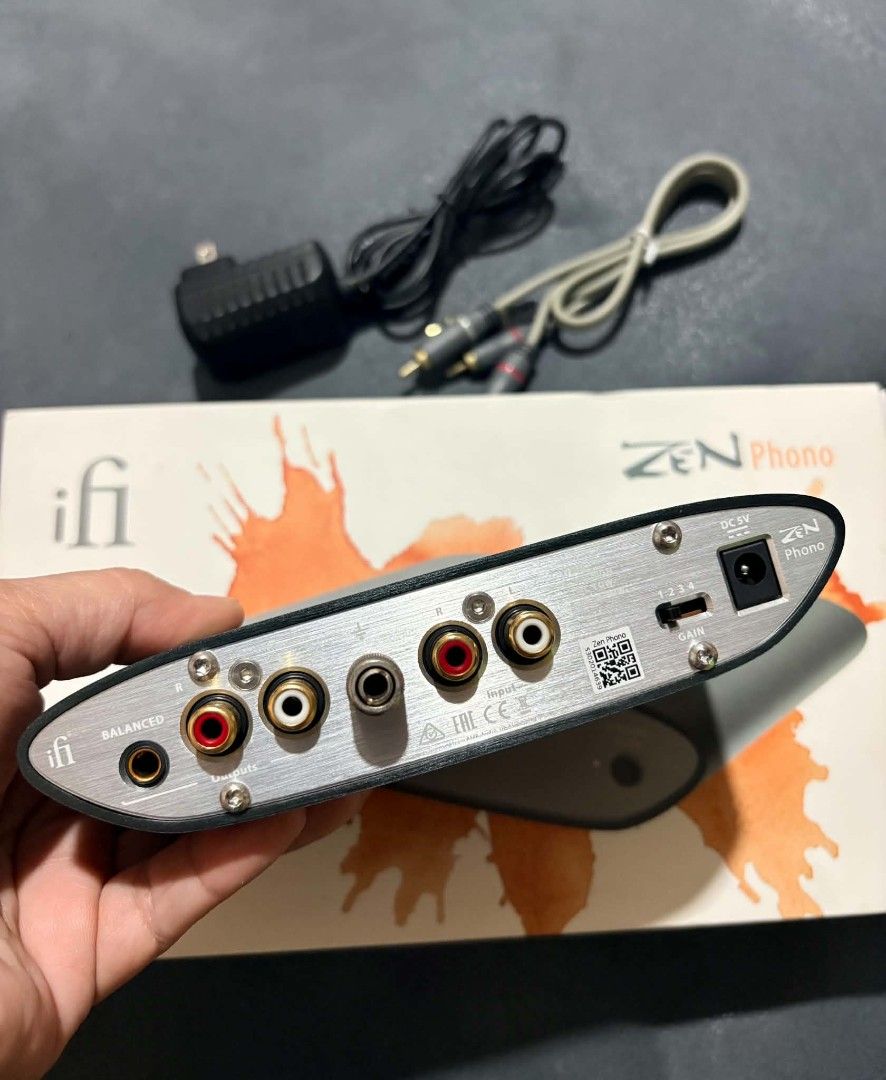 iFi ZEN Phono MM/MC Phono Preamp (Category: Soundbars, Speakers & Amplifiers) located in Pasig City. Submitted by swooshph (Listing ID 1464812004, Image 2). Description: iFi ZEN Phono preamplifier Cartridge Support: Moving Magnet (MM) and Moving Coil (MC) Condition: Powers on and operates perfectly, clean faceplate and rear panel - Included: Power adapter, RCA cable, and original box - Ports: All connection ports intact and fully functional..