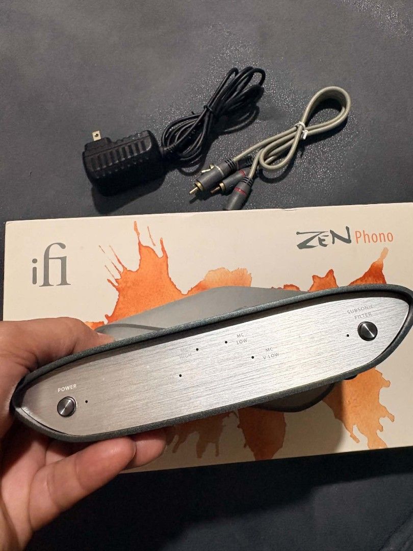 iFi ZEN Phono MM/MC Phono Preamp (Category: Soundbars, Speakers & Amplifiers) located in Pasig City. Submitted by swooshph (Listing ID 1464812004, Image 1). Description: iFi ZEN Phono preamplifier Cartridge Support: Moving Magnet (MM) and Moving Coil (MC) Condition: Powers on and operates perfectly, clean faceplate and rear panel - Included: Power adapter, RCA cable, and original box - Ports: All connection ports intact and fully functional..