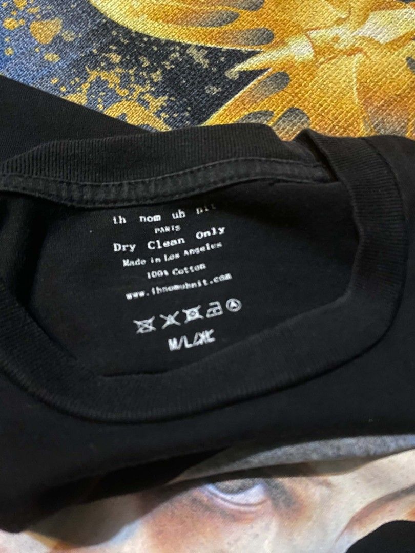 Ih Nom Uh Nit Stranger Things Eleven Graphic Tee (Category: Tshirts & Polo Shirts ) located in Manila. Submitted by thrift_sta.20 (Listing ID 1464868990, Image 3). Description: - Brand: Ih Nom Uh Nit Paris - Color: Black - Design: Large Stranger Things Eleven graphic on front, brand lettering across back shoulders - Material: 100% Cotton, Made in Los Angeles - Fit: Regular boxy cut - Care: Dry clean only - Condition: Excellent/Ready to wear.