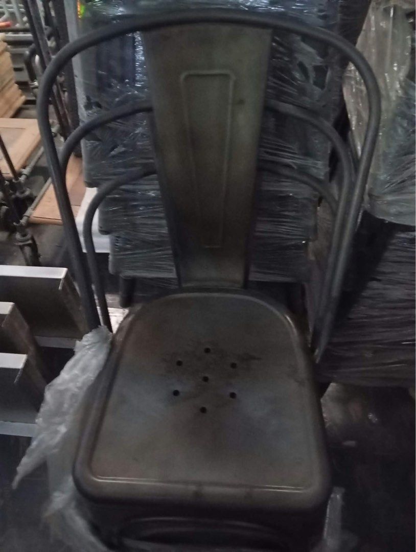 Industrial Style Metal Chair and Stool Stackable Set (Category: Chairs) located in Makati City. Submitted by scardycat078900 (Listing ID 1464895268, Image 1). Description: - Industrial style metal chairs and stools with a dark gunmetal distressed patina - Ventilated seat design featuring convenient drainage holes - Ergonomic curved backrest for added support 50 pcs each design(50pcs with sandala/walang sandalan) total of 100pcs. Used kaso nag clo