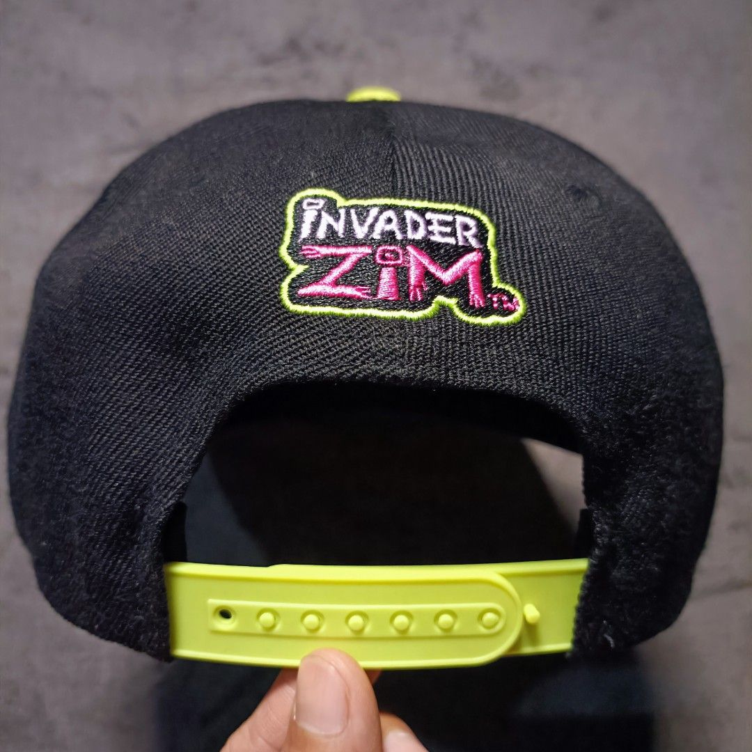 Invader Zim Gir Doom Snapback Hat Nickelodeon (Category: Caps & Hats) located in Manila. Submitted by nye.seller (Listing ID 1464886629, Image 3). Description: - Official Nickelodeon Invader Zim merchandise (2024) - Features embroidered Gir graphic with "DOOM!" on the front - All-over bright green lightning bolt print on the flat brim - Neon green adjustable plastic snap closure and matching top button - Invader Zim logo embroidered above the bac